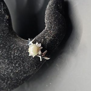 B-1 Silvertone ring with faux pearl center and clear accents